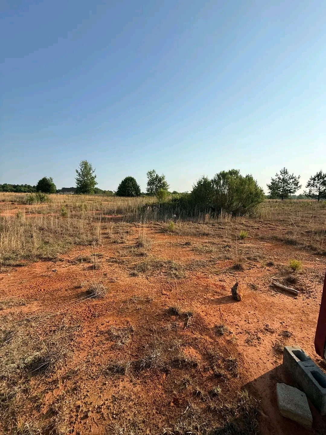 TCB Farms & Clearing land clearing project — large flat field cleared of brush